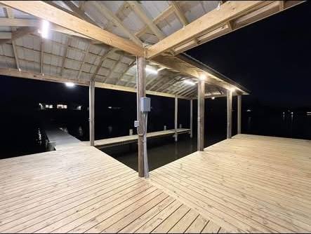 Boathouse deck lit up after dark